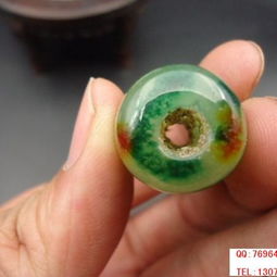 民國遺珍 冰地飄花福祿雙全翡翠勒子的鑒賞與市場行情